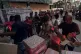 Locals queue up to receive support after the hurricane in Ac
