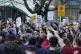 Locals demonstrate outside Stoke Newington police station in