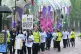 Greenpeace activists march through central London in a prote