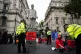 A statue of Prime Minister Boris Johnson splattered with oil