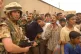BLAIR’S WARS: A British soldier trains his rifle on a crow