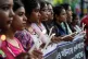 Student members of the Congress Party hold candles in Kolkat