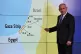 Israeli Prime Minister Benjamin Netanyahu stands by a map th