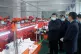 Xi Jinping inspects a factory production line in Laoxian, Ap