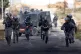 Israeli border police charge Palestinian demonstrators as th