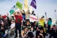 FORWARDS OR BACK? People take part in a rally in favour of t