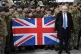 Boris Johnson poses with British troops during talks in Pola