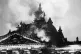 FRAME-UP: Firemen work on the burning Reichstag, 1933