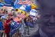 Devotees wait for former president Donald Trump to go by in 