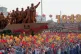 RED MILESTONE: Huge crowds dance at a parade for the 70th an