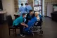 Care home resident Vera Levick, 106, is comforted by staff b