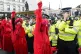 Police and XR demonstrators as the group parked a bus on Lon