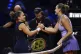 Aryna Sabalenka of Belarus, right, and Jasmine Paolini of Italy shake hands after the women's singles semi-final tennis match of the WTA tour, in Stuttgart, Germany, Sunday, April 20, 2025