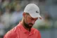 Novak Djokovic of Serbia reacts during his match against Matteo Arnaldi of Italy during the Madrid Open tennis tournament in Madrid, Spain, Saturday, April 26, 2025
