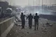 In this photo provided by Islamic Republic News Agency, IRNA, men walk through debris after a massive explosion rocked a port near the southern port city of Bandar Abbas, Iran, April 26, 2025. Photo: Mohammad Rasoul Moradi/IRNA via AP