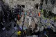 Yemenis crowd at Farwah popular market, which Houthis said was struck by U.S. airstrikes, in Sanaa, Yemen, April 21, 2025