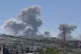 This frame grab from a video provided May 8, 2025, shows smoke rise following Israeli airstrikes that targeted hilltops near Nabatieh town, south Lebanon