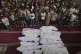Mourners pray over the bodies of Palestinians killed in an Israeli military airstrike that hit a U.N. school, during a funeral in Jabaliya, northern Gaza Strip, on Monday, May 12, 2025