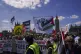 Demonstrators hold flags and banners during a demonstration in support of the Palestinian people in Gaza, in London, May 17, 2025