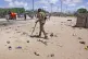 Security officer patrol near the scene of a suicide bomber attack in Mogadishu, Somalia, May 18, 2025