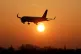 An plane landing during sunrise at London Gatwick Airport in Crawley, West Sussex
