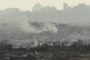 Buildings that were destroyed during the Israeli ground and air operations in the Gaza Strip are seen from southern Israel on May 4, 2025