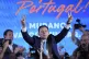 Incumbent Prime Minister and leader of the Social Democratic Party Luis Montenegro gestures while addressing his supporters following Portugal's general election, in Lisbon, May 19, 2025