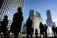 Office workers and commuters walking through Canary Wharf in London during the morning rush hour