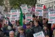People take part in a protest organised by the Rail, Maritime and Transport union (RMT) opposite Downing Street, London, over the proposed closure of railway station ticket offices, August 31, 2023