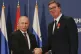 Russian President Vladimir Putin (left) shakes hands with Serbian President Aleksandar Vucic after being awarded the Order of Alexander Nevsky in Belgrade, Serbia, January 17, 2019
