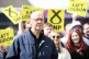First Minister of Scotland John Swinney speaking to activists as he joins Katy Loudon, SNP candidate in the upcoming Hamilton, Larkhall and Stonehouse by-election on 5 June, at Alloway Gardens bus stop, Hamilton, May 3, 2025