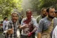 An injured man is helped to leave the scene after an explosion in downtown Tehran, amid Israel's three-day campaign of strikes against Iran, June 15, 2025