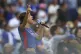 Music artist Nezza sings the national anthem prior to a baseball game between the Los Angeles Dodgers and the San Francisco Giants in Los Angeles, June 14, 2025