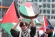 A person playing a bodhran whilst taking part in a protest organised by the Ireland-Palestine Solidarity Campaign