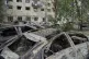 Damaged private cars are seen on the site of Russia's deadly missile attack on Tuesday, in Kyiv, Ukraine, June 18, 2025