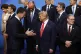 President Donald Trump, center, speaks with NATO Secretary General Mark Rutte, left, during a group photo of NATO heads of state and government at the NATO summit in The Hague, Netherlands, Wednesday, June 25, 2025