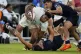 England's Immanuel Feyi-Waboso takes on the U.S defence during the men's rugby union international between England and the USA at Audi Field in Washington, July 19, 2025