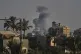 Smoke rises following an Israeli army air strike in Deir al-Balah, central Gaza Strip, July 22, 2025