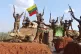 In this image released on July 16, 2025, by The Myanmar Military True News Information Team, soldiers are seen celebrating a victory at one of the captured outposts in Nawnghkio. Photo: The Myanmar Military True News Information Team via AP