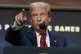 President Donald Trump answers questions from reporters after signing an executive order about the 2028 Los Angeles Olympic Games, in the South Court Auditorium of the Eisenhower Executive Office Building on the White House campus, August 5, 2025,