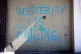 Graffiti that reads Austerity is Failing