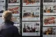 A man looks through an estate agent's window in Glasgow, Scotland