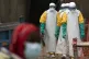 Health workers dressed in protective gear begin their shift at an Ebola treatment center in Beni, Congo DRC, July 16, 2019