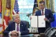 President Donald Trump speaks as Defense Secretary Pete Hegseth holds a signed executive order in the Oval Office of the White House, September 5, 2025, in Washington