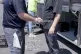 This image from video provided by US Immigration and Customs Enforcement shows a person being chained at the Hyundai Motor Group’s electric vehicle plant in Georgia, September 4, 2025