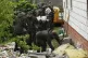 Territorial defense officers clean up debris from the destroyed roof of a house, after multiple Russian drones struck in Wyryki near Lublin, Poland, September 11, 2025