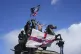 People demonstrate during the Tommy Robinson-led Unite the Kingdom march and rally in London, Saturday, Sept. 13, 2025