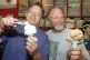 Jerry Greenfield (left) and Ben Cohen scoop ice cream cones during their 20th anniversary party at a scoop shop in Burlington, Vt., in this May 5, 1998 photo