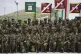Haitian soldiers pose for a group photo during a closing ceremony at the end of their military training provided by the Mexican Army, in San Miguel de los Jagueyes, Mexico, September 19, 2025