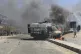 A police vehicle is set on fire during a protest by locals demanding federal statehood from the Indian government, in the high-altitude Leh town, in the region of Ladakh, India, Wednesday, Sept. 24, 2025